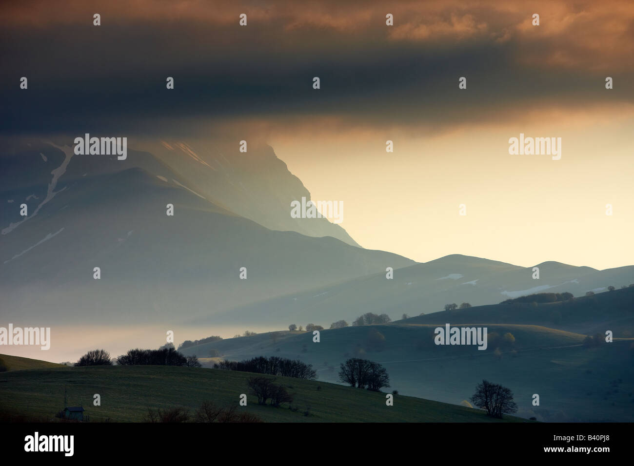 the mountains of Monti Sibillini National Park at dawn from the Forca della Canapine, Umbria, Italy Stock Photo