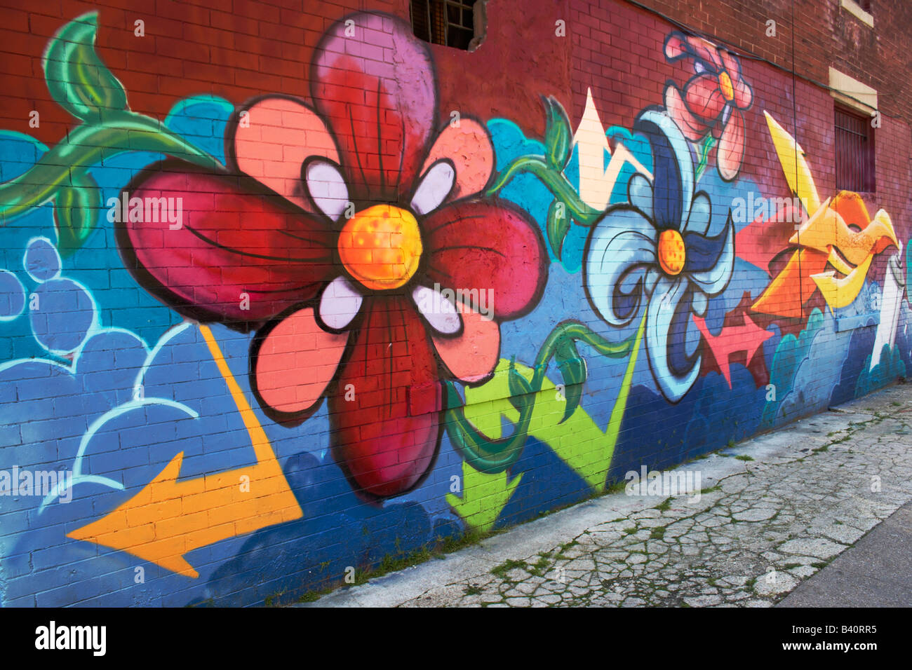 A colorful contemporary mural in the culturally diverse Adams Morgan neighborhood of Washington DC Stock Photo