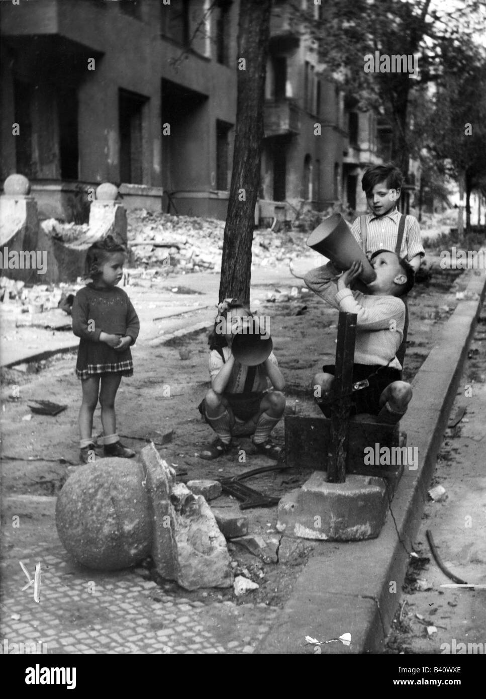 post war period, Germany, children playing in destroyed street, 1947, Stock Photo