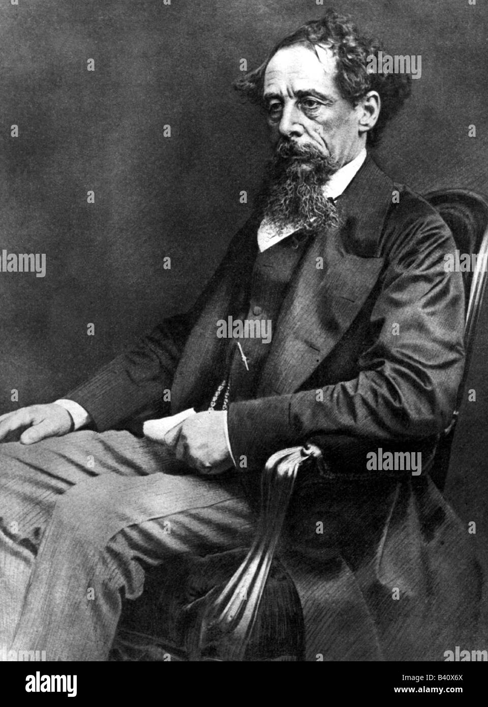 Dickens, Charles, 7.2.1812 - 9.7.1870, English author / writer, sitting in a chair, half length, , Stock Photo