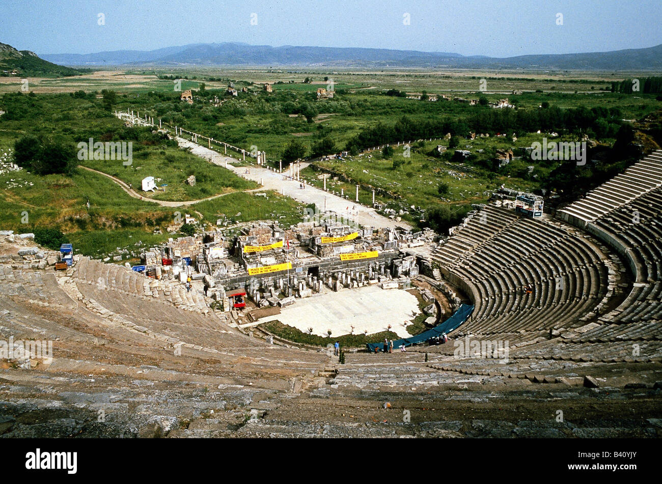 geography / travel, Turkey, Ephesus, theatre from 3rd century BC, renewed in 1st century AD, overview, view over Arcadiana (boulevard), excavations, antiquity, roman theatre, viewed from above, street leading to harbour in former times, coast, coastline is approx. 15 km away today, fifteen, third, first, , Stock Photo