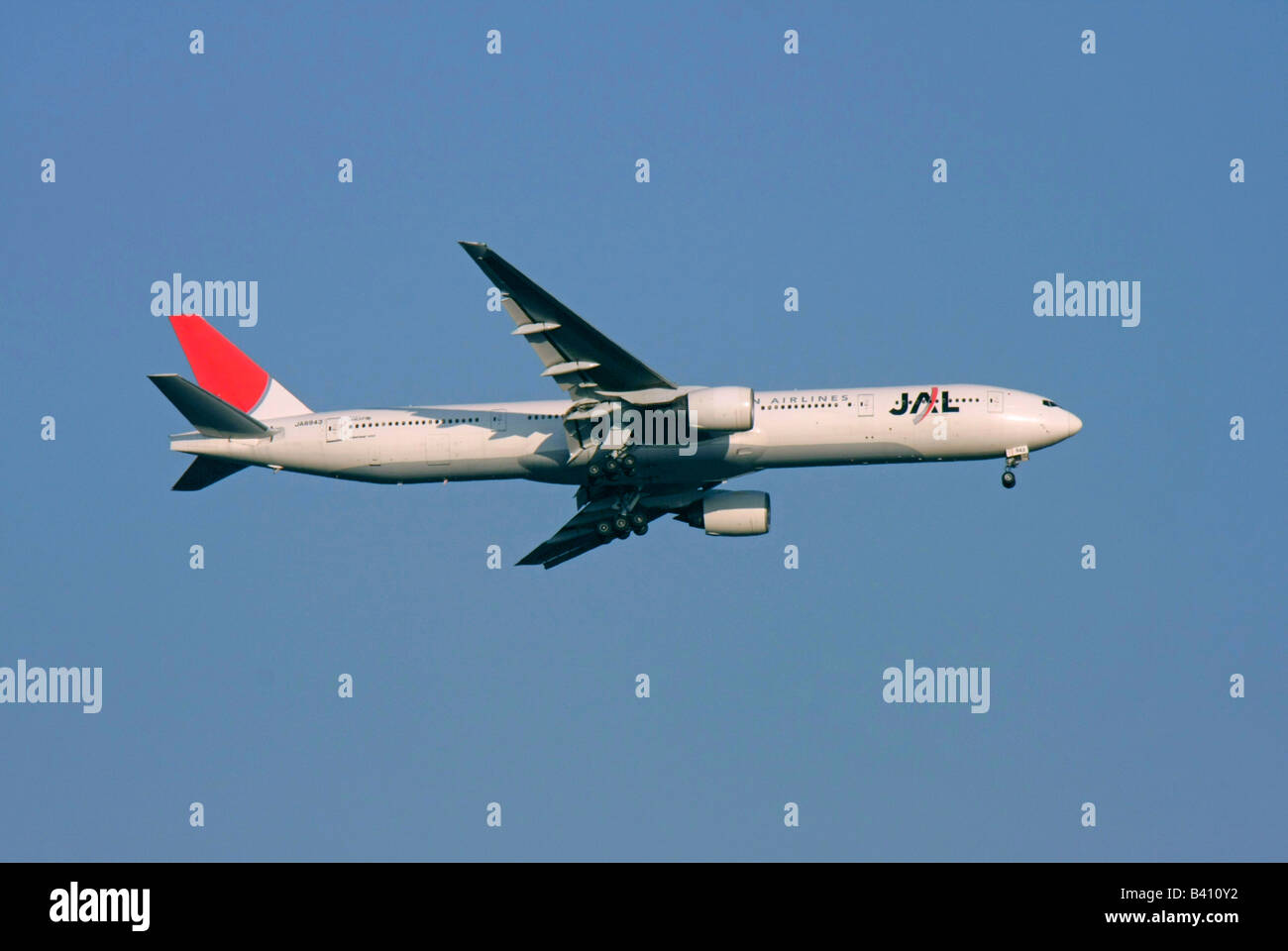 Japan Airlines Boeing 777 passenger aircraft is approaching to land Tokyo Japan Stock Photo