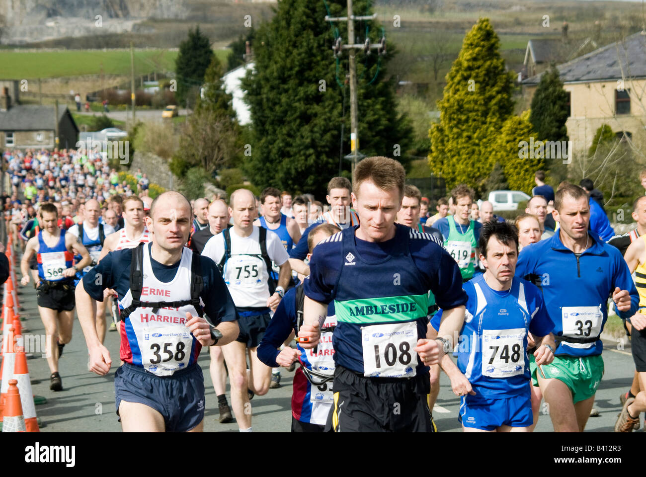 People competing in the three peaks long distance race challenge in Yorkshire England Stock Photo
