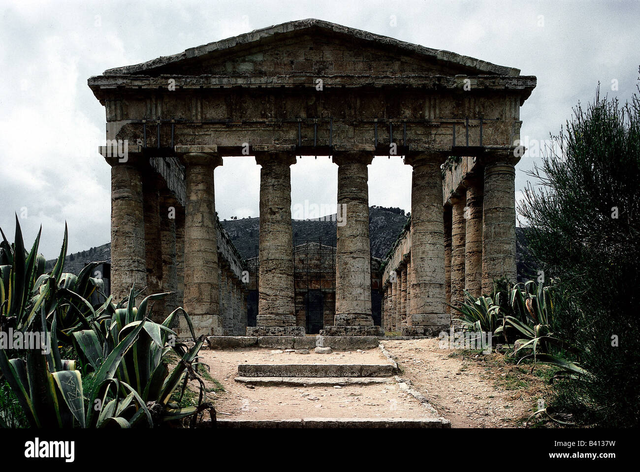 geography / travel, Italy, Sicily, Segesta (Egesta), Greek colony, founded 7th or 6th century BC, doric temple, built from 430 BC by the Elymians, forefront, Magna Graecia, in peloponnesian War allied with Athens, under carthagian influence from 409 BC, plundered by Agathocles, from 263 BC allied with Rome, from 227 BC roman province Sicilia, antiquity, historical, historic, ancient, doric architecture, columns, sixth, seventh,  ancient world, Stock Photo