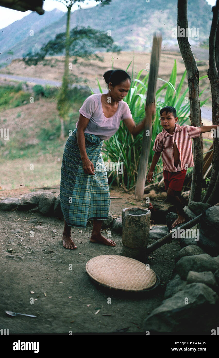 geography / travel, Indonesia, people, woman pounding rice, little child, processing, sarong, , Stock Photo