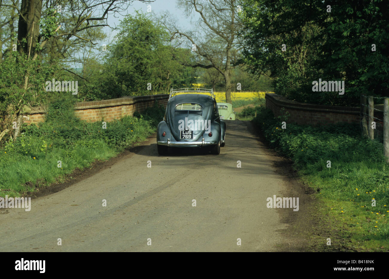 Volkswagen Beetle. car auto classic driven road Stock Photo
