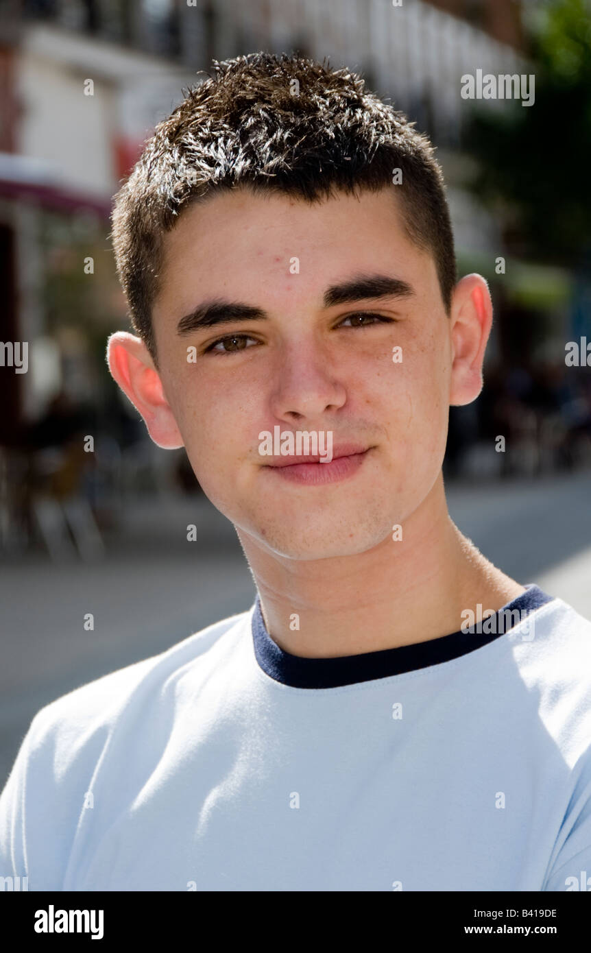 Teenage boys in Street mobile phones fighting drinking smoking Model  Released Shoot No 3643 Stock Photo - Alamy