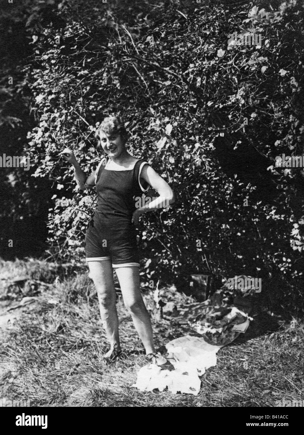 bathing, beach fashion, woman in swimsuit standing in meadow, Herrsching, 1926, Stock Photo