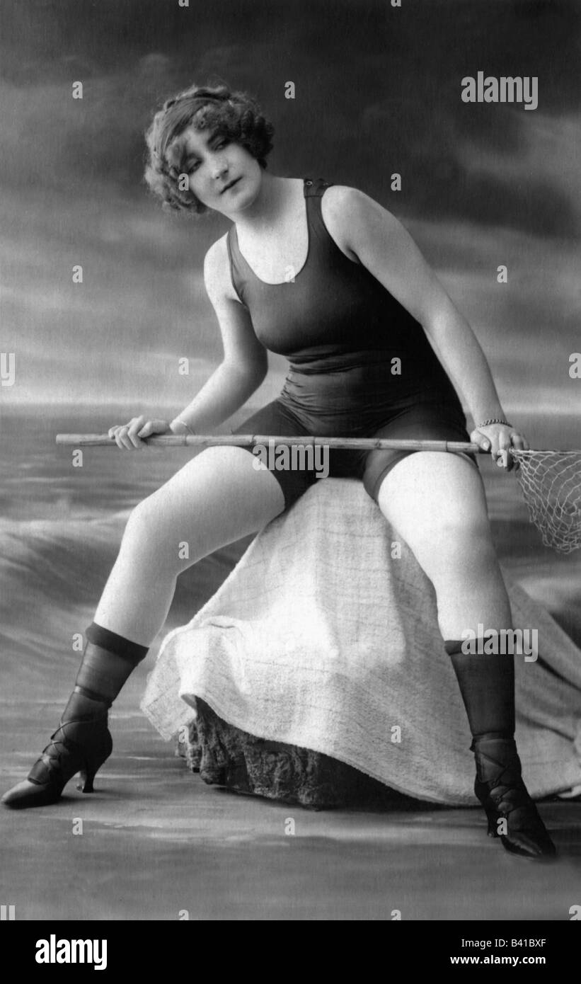 bathing, swimsuit, young woman, wearing swimsuit, full length, sitting, studio, 1920, Stock Photo