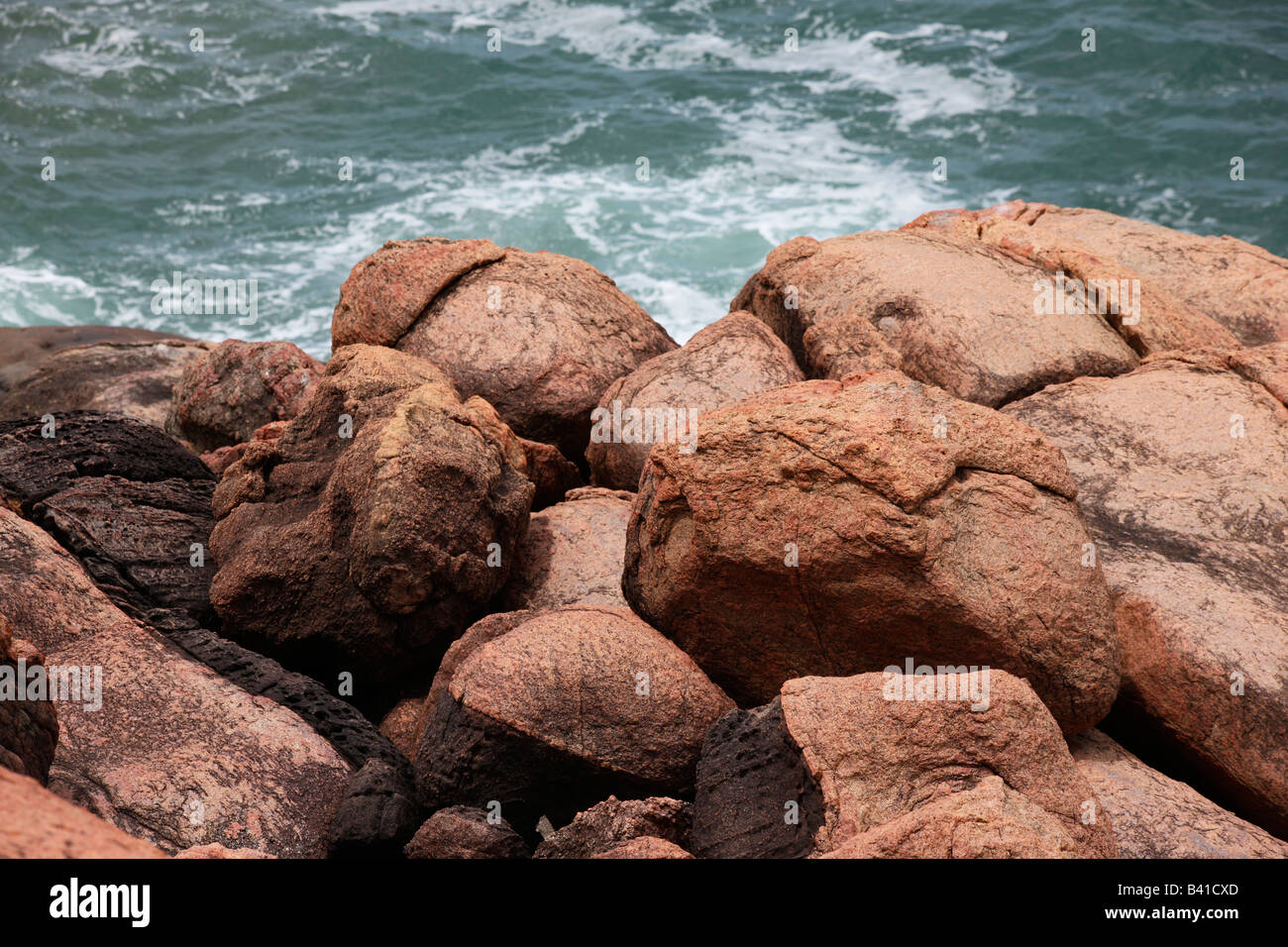 Red Rocks at Kovalam beach,Kerala,India Stock Photo - Alamy