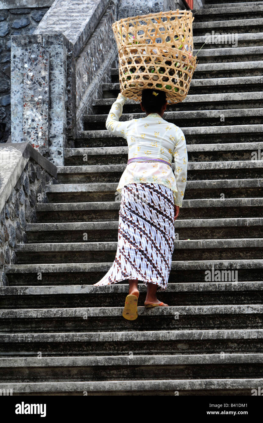 village temple festival, lady taking offerings ,desa pakraman bebetin,sawan , buleleng regency , north west bali,indonesia Stock Photo