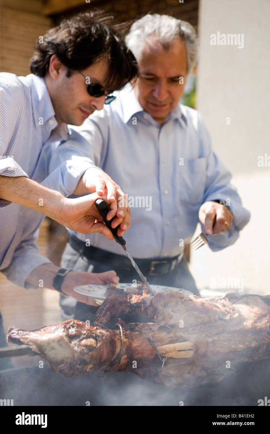 A traditional Greek Easter meal, lamb on a spit Stock Photo Alamy