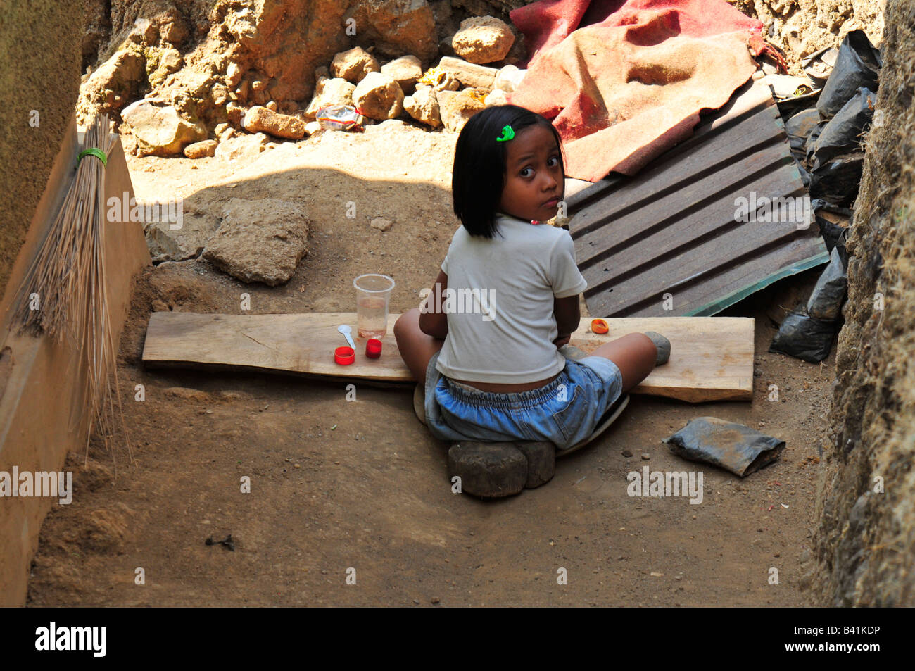 bali aga village life, little girl playing, bali aga village life, semberan , north bali , indonesia Stock Photo