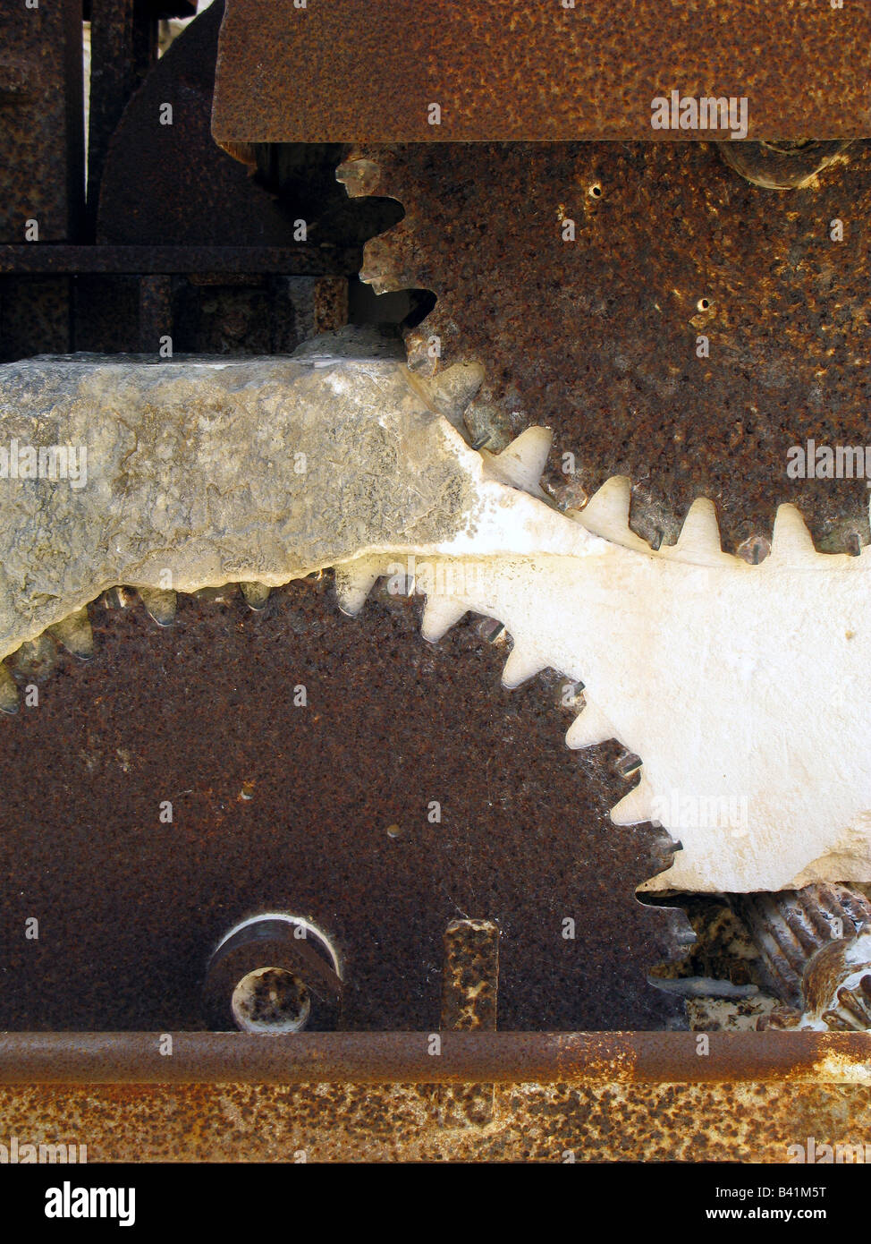 Rusty stone cutting blades in abandoned stone quarry, Lithica, S'Hostal, Ciutedella, Menorca Stock Photo