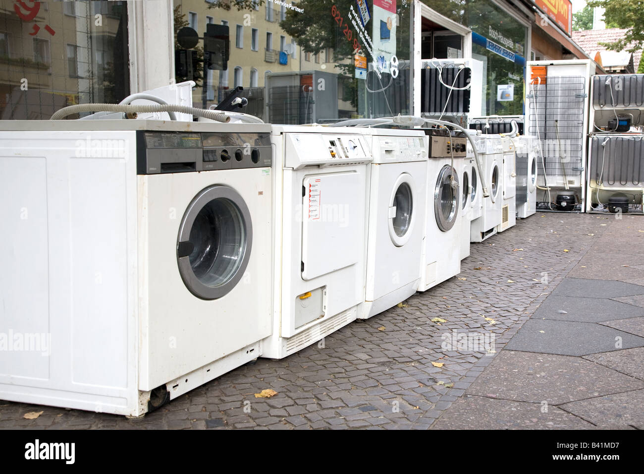 second hand washing machines stand outside a Berlin second hand shop Stock  Photo - Alamy