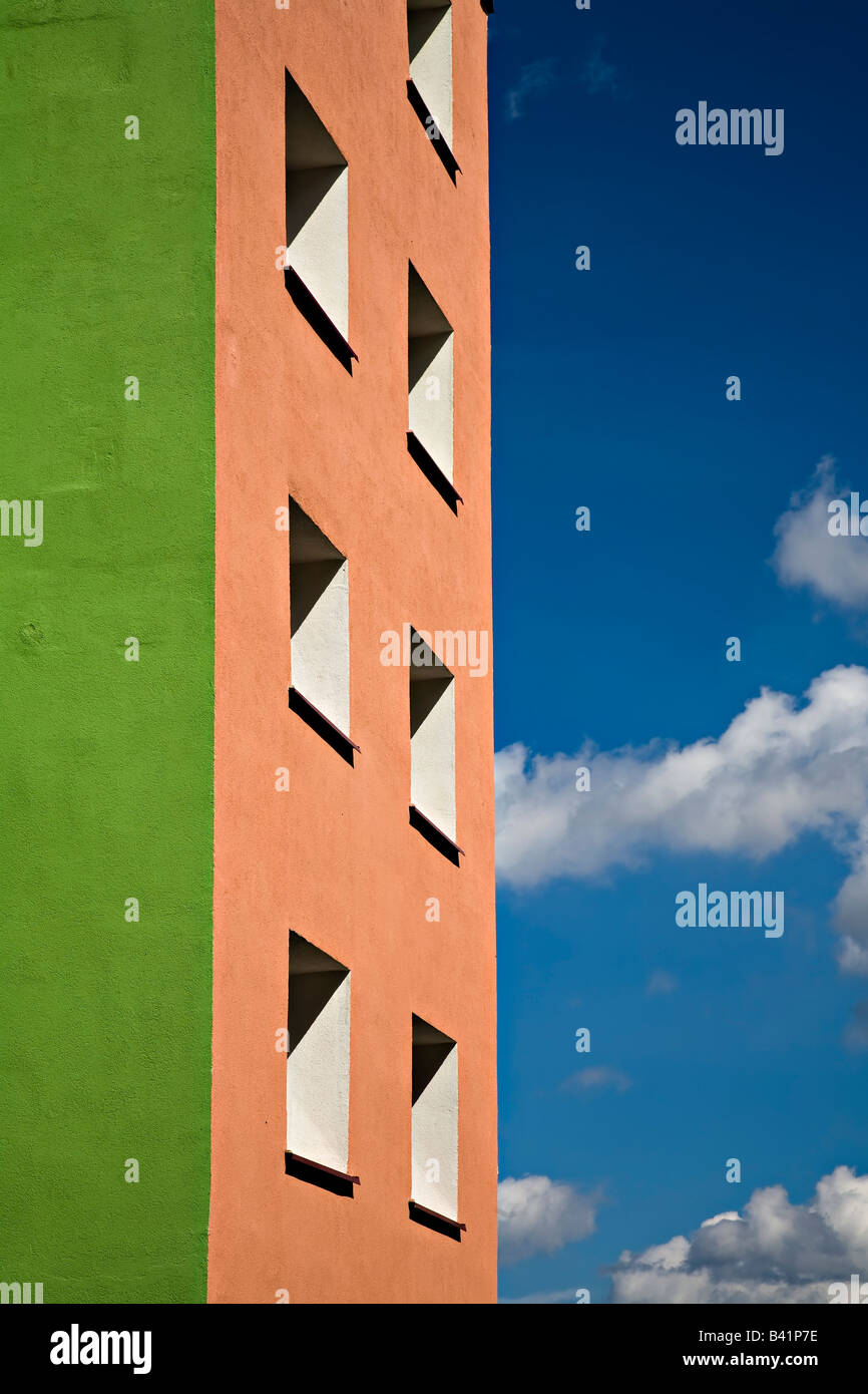Windows in brightly painted concrete blocks of flats Miastko Poland Stock Photo