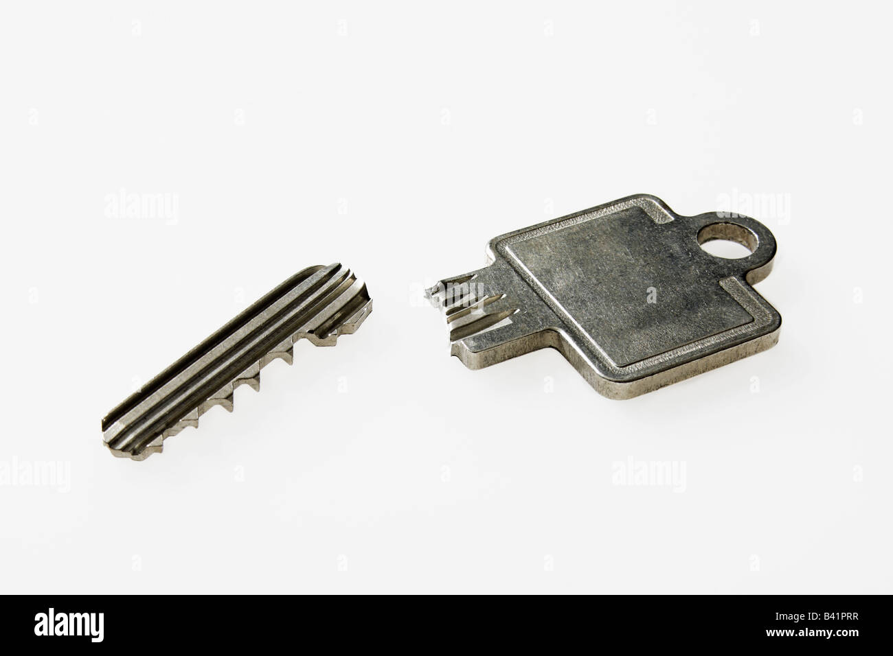 Broken key on white background Stock Photo Alamy