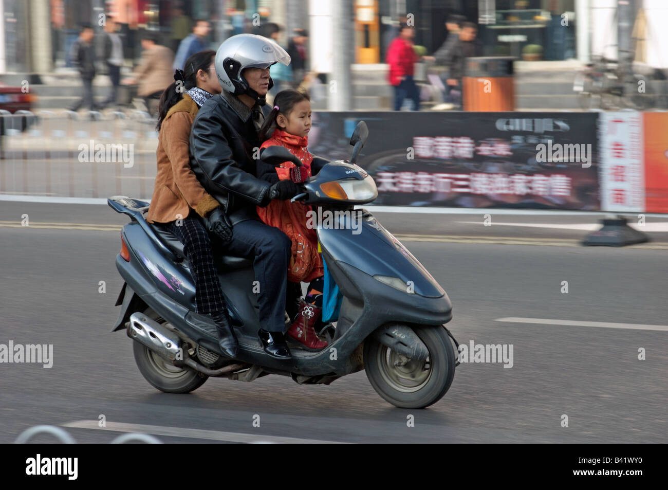 Family china scooter hi-res stock photography and images - Alamy