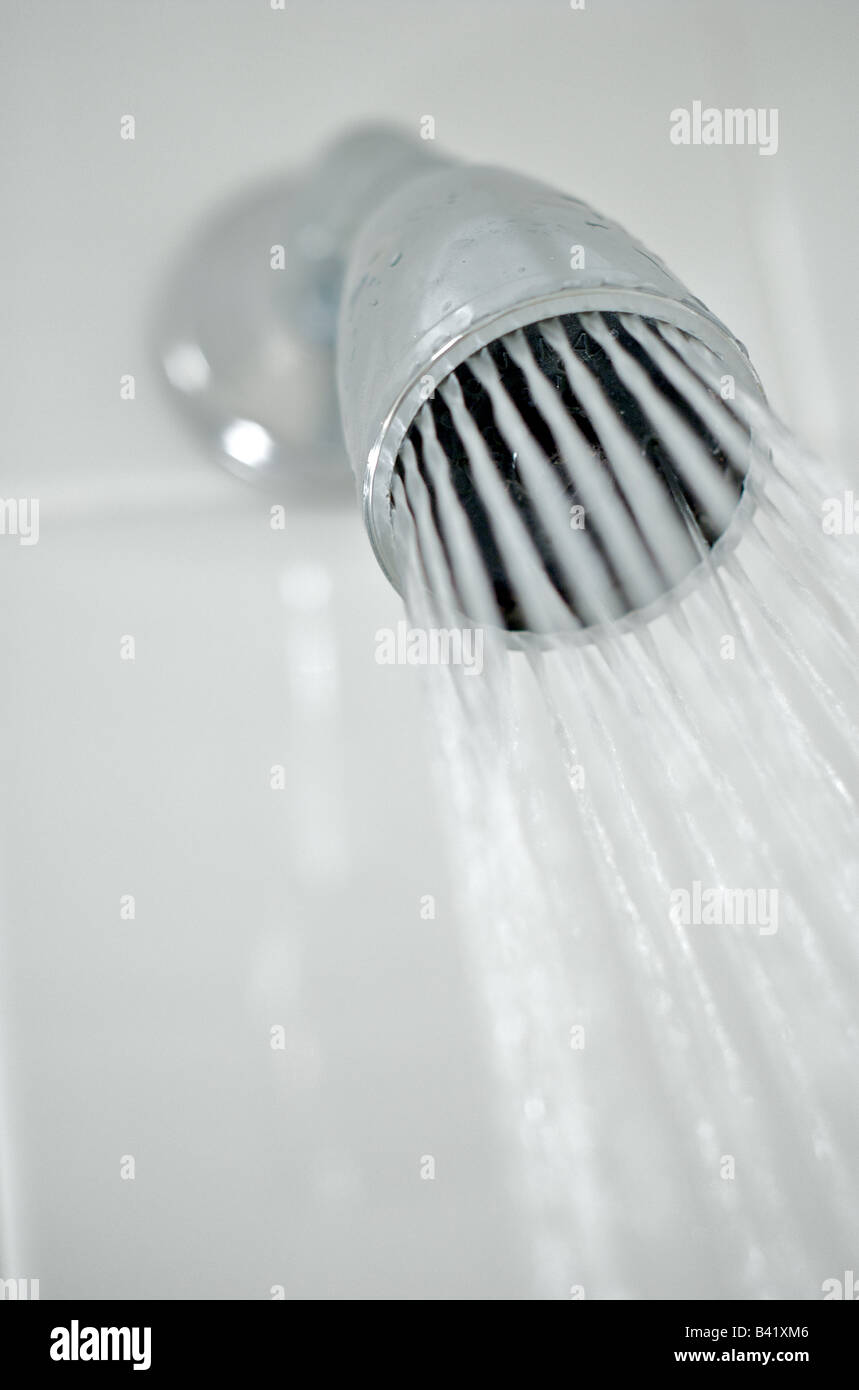 Closeup of Shower Head Spraying Water Stock Photo