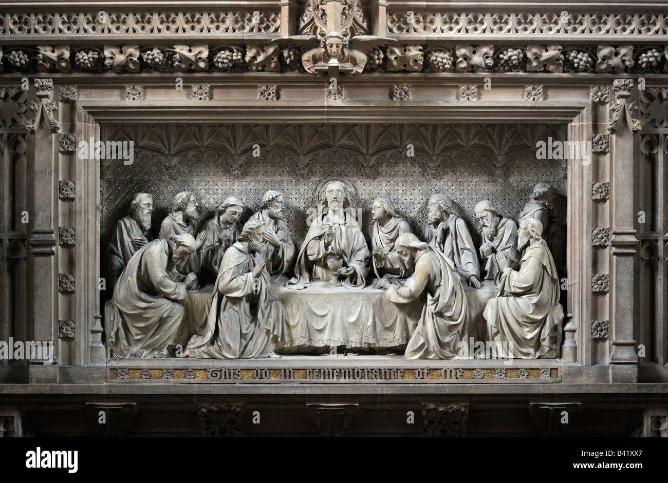Carved stone reredos, "The Last Supper". Church of Saint Michael the Archangel, Whittington, Lancashire, England, United Kingdom Stock Photo