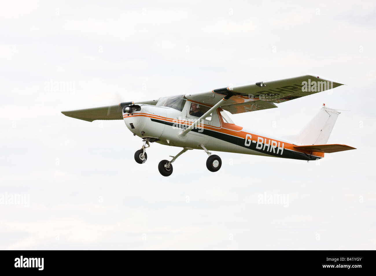 Reims Cessna FA150K Aerobat G-BHRH in flight after take-ff from Breighton Airfield Stock Photo