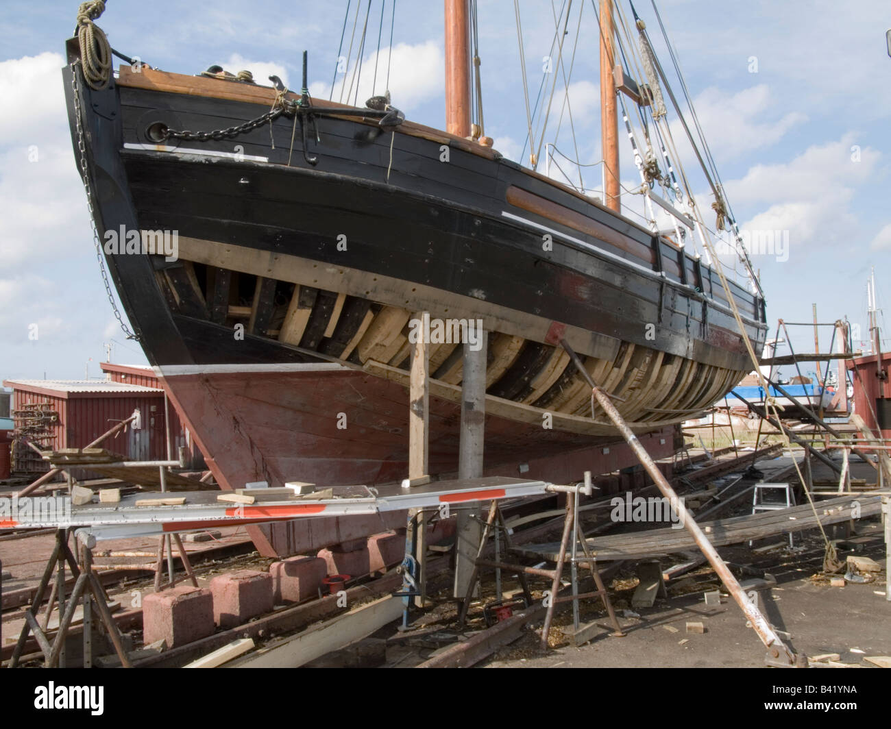 Vintage cutter under repair on a shipyard in Gilleleje. Stock Photo