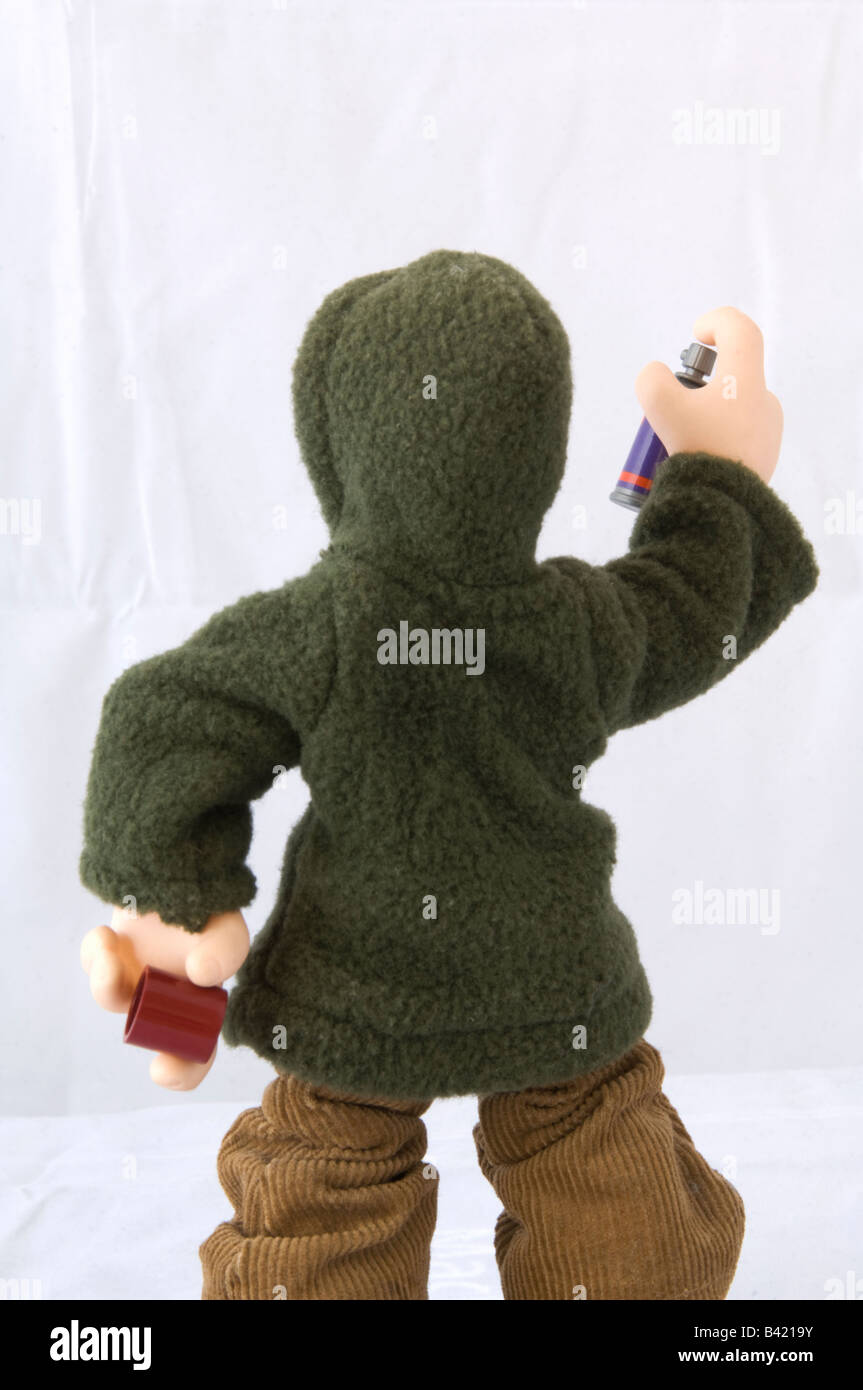 Model of a graffiti artist posed with spray can Stock Photo - Alamy