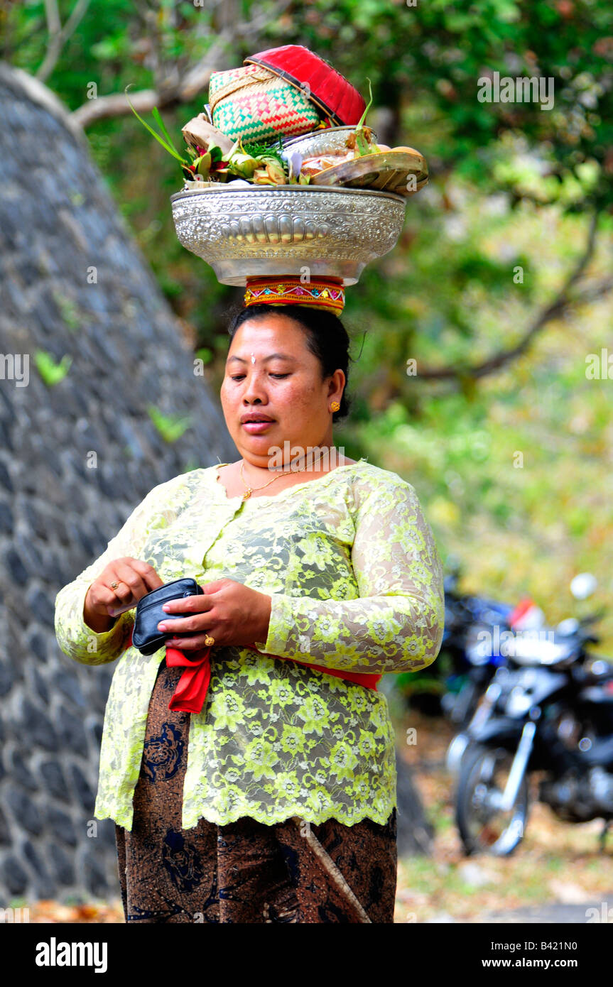 lady taking offerings to village temple, village temple festival, temple ,desa pakraman bebetin,sawan , north bali Stock Photo