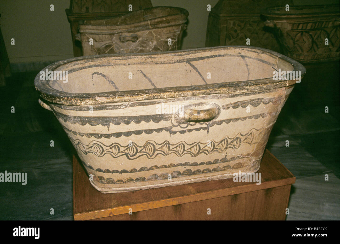 A Minoan bathtub one of the oldest in existence at the Minoan Palace of Knossos near the city of Iraklion on the island of Crete Stock Photo