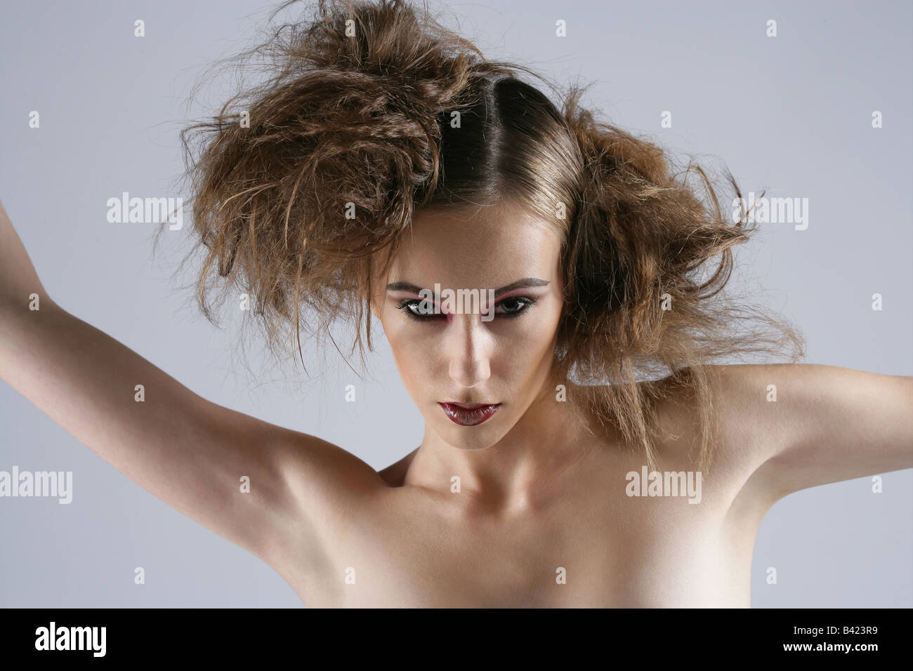 Fashion image female model with wild hair Stock Photo