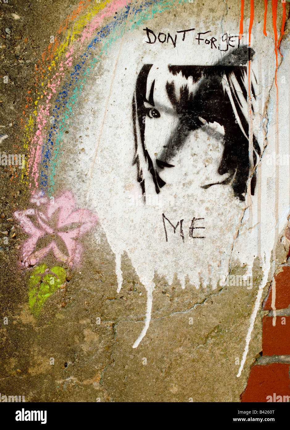 A stencil graffito shows the face of Madeleine McCann with the words 'DONT FORGET ME' added. Stock Photo