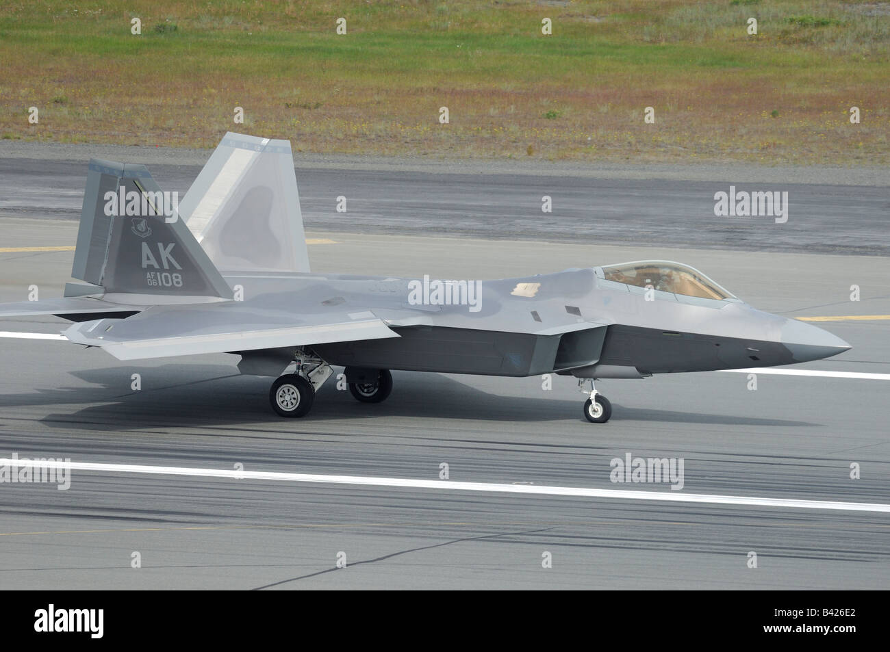 Modern and stealth american jet fighter F-22A Raptor on runway- Arctic Thunder airshow 2008 - Anchorage - Alaska - USA Stock Photo