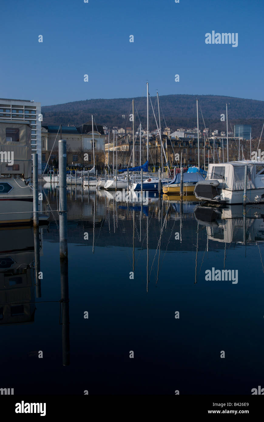Boats in harbour calm waters hi-res stock photography and images - Alamy