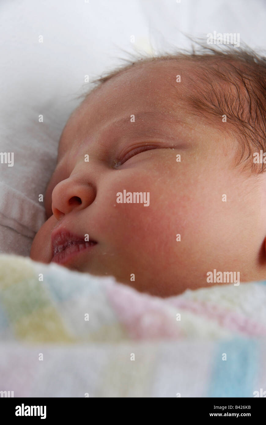 Baby wrapped in blankets hires stock photography and images Alamy