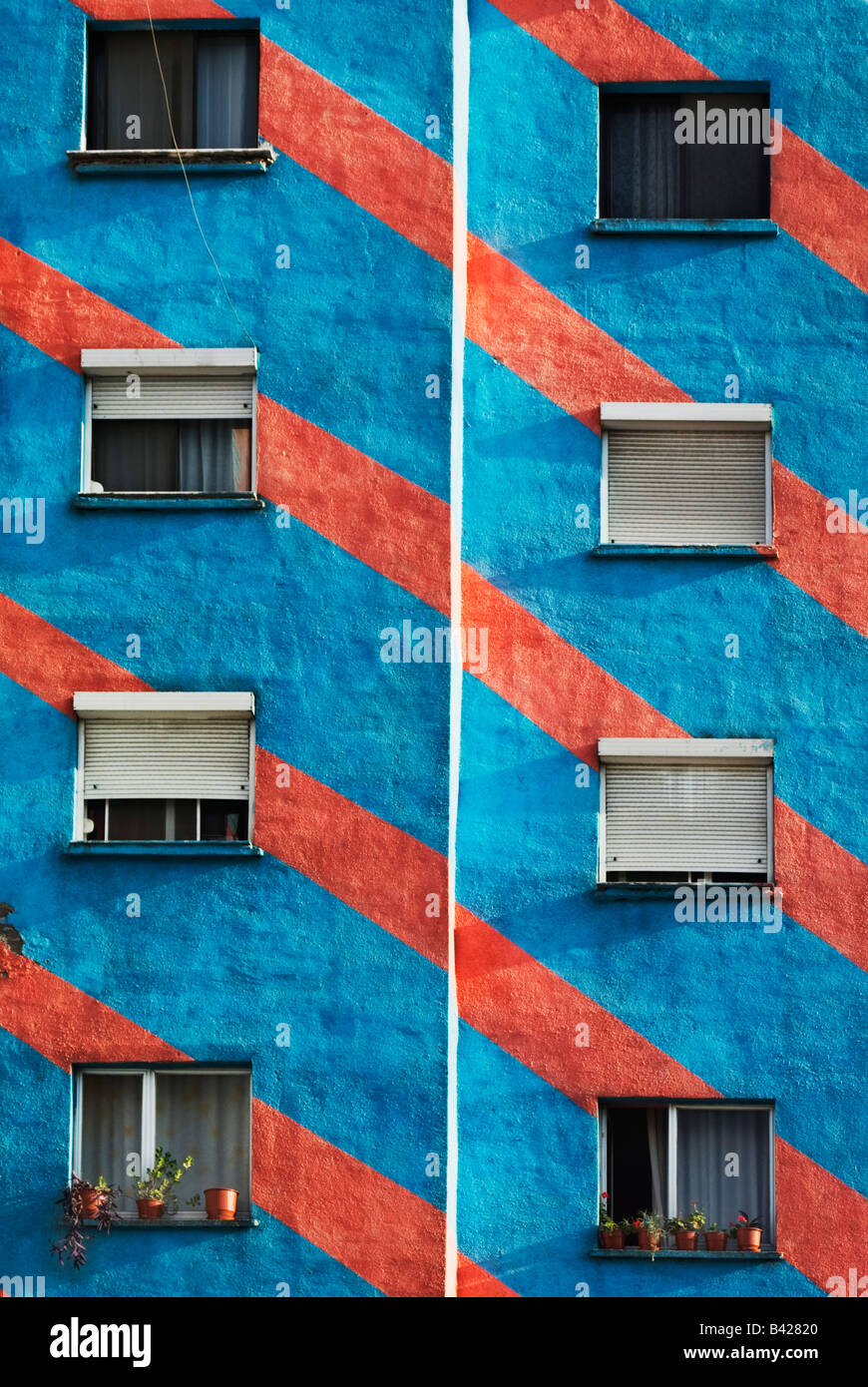 Blue and red stripy apartment block in Tirana, Capital of Albania Stock Photo