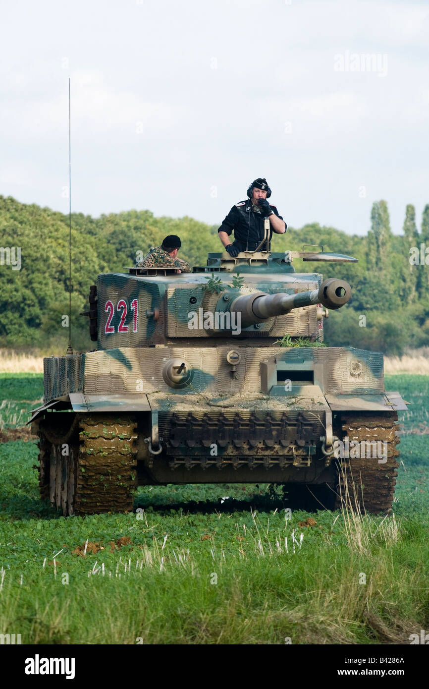German WWII Tiger Tank crosses a field of young crops in a battle re-enactment at Spanhoe Airfield, Northamptonshire Sept 2008 Stock Photo