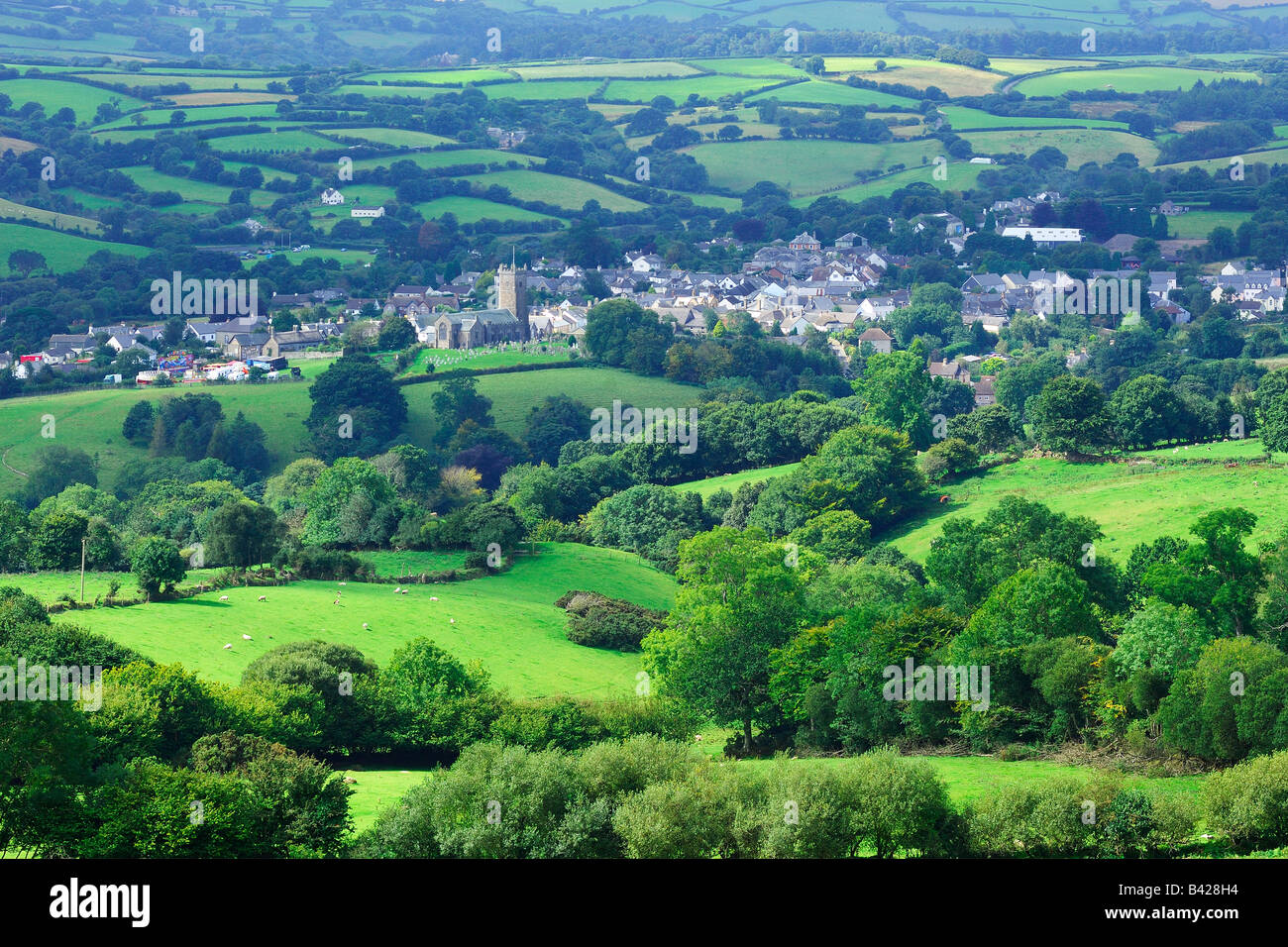 The village of Moretonhampstead on Dartmoor National Park with lush rolling green fields and farmland all around Stock Photo