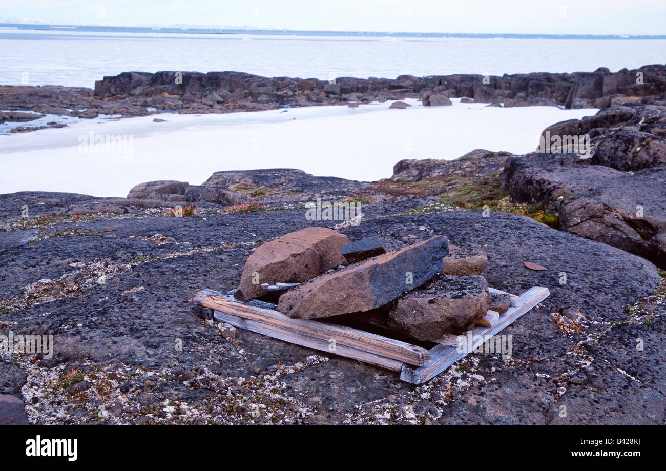 Old animal trap for Artic foxs in Svalbard Stock Photo