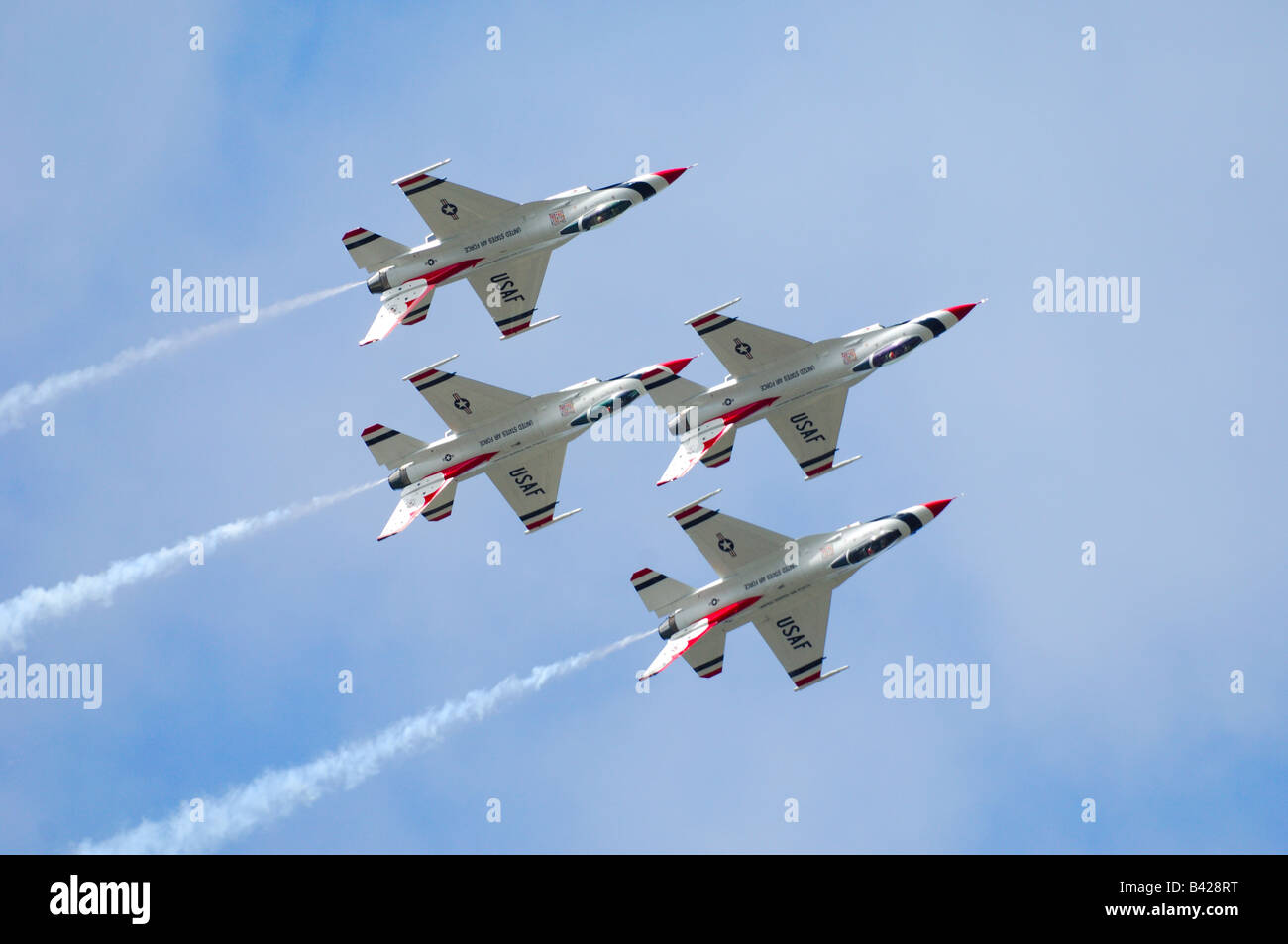 F-16 jet fighter of the aerobatic team Thunderbirds in flight at Elmendorf Air Force Base Stock Photo