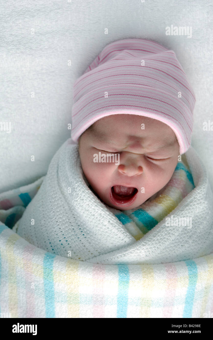 A newborn baby swaddled in blankets Stock Photo Alamy