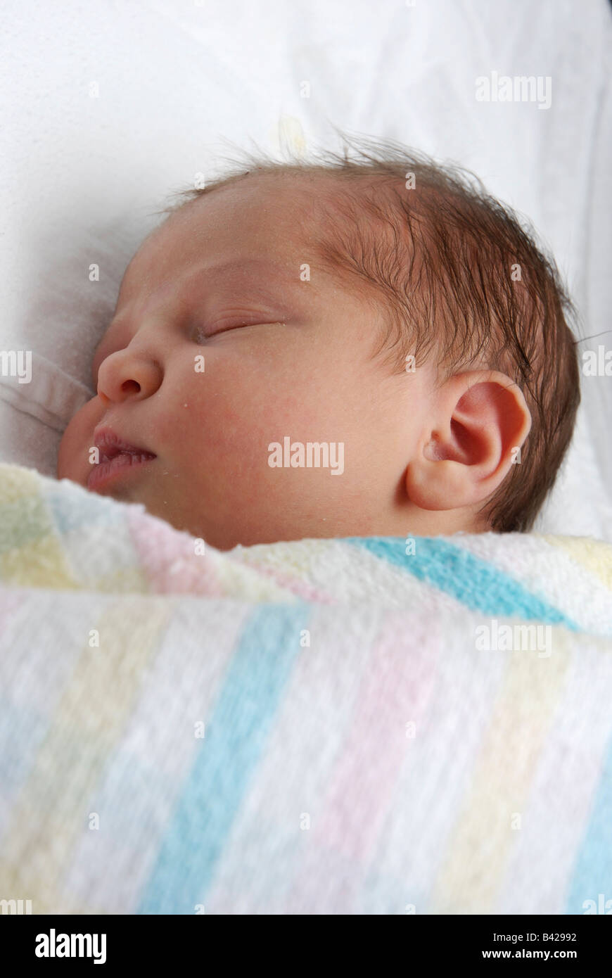 Baby wrapped in blankets hires stock photography and images Alamy