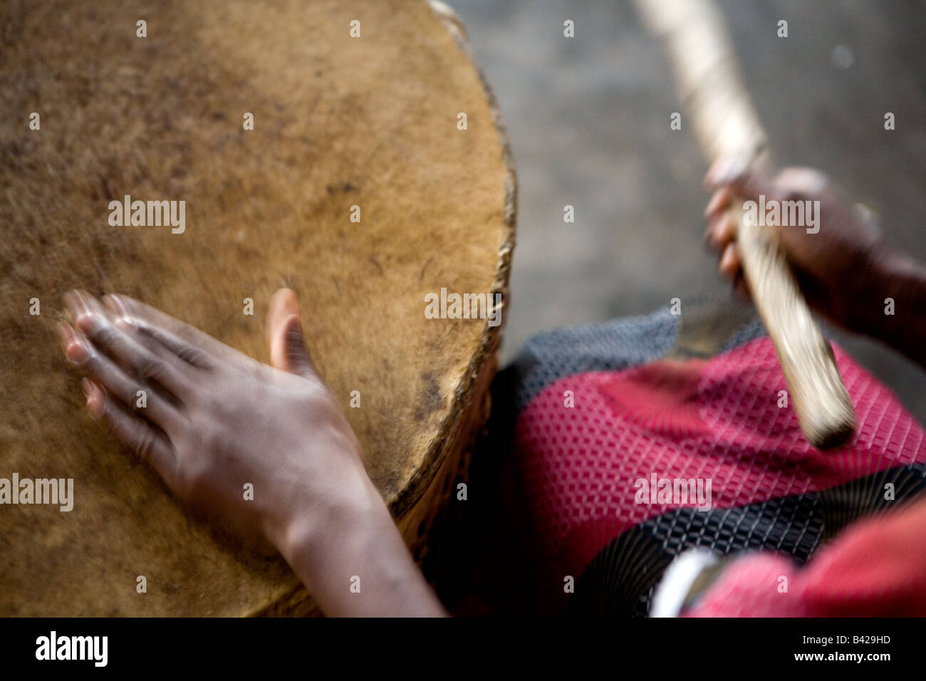 Leading the children's church choir by beating a rhythm with hand and ...