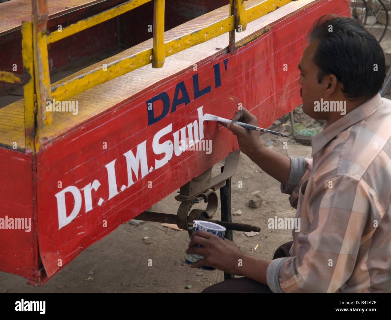 Sign painter works Stock Photo