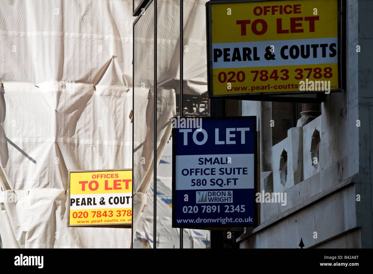 To let signs hanging off side of building in London Stock Photo
