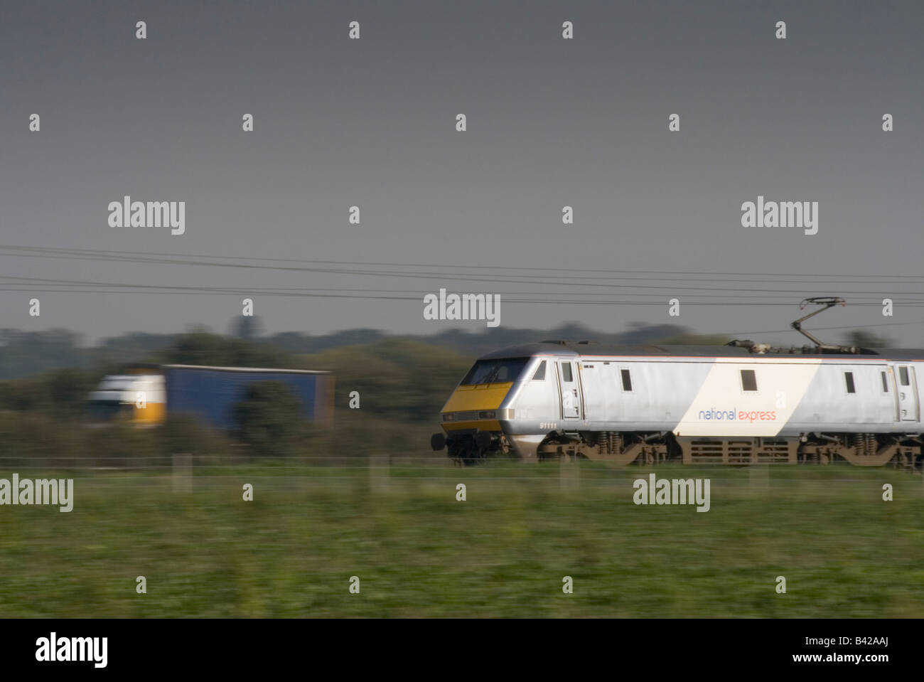 Train racing up the East Coast Main Line Stock Photo Alamy