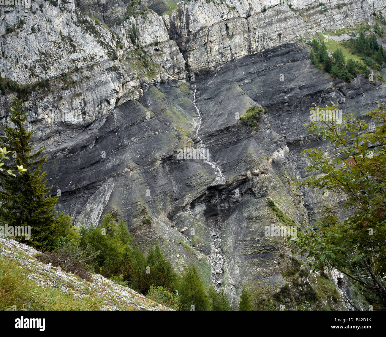 Wild mountainscape with a small waterfall on the climb to Col du Sanetsch near Derborence Wallis Valais  Alps Switzerland Europe Stock Photo