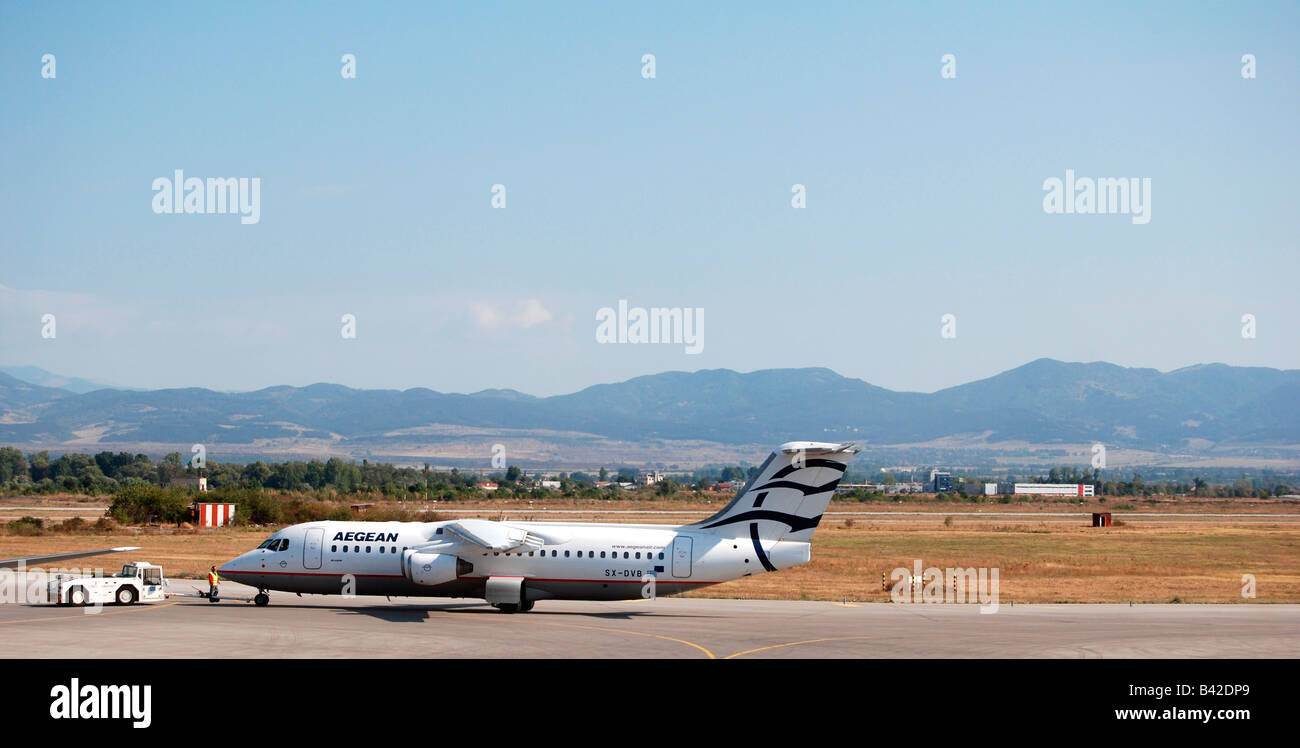 Bulgaria Sofia Airport a Greek AegeanAir plane on the runway ready for take off Stock Photo