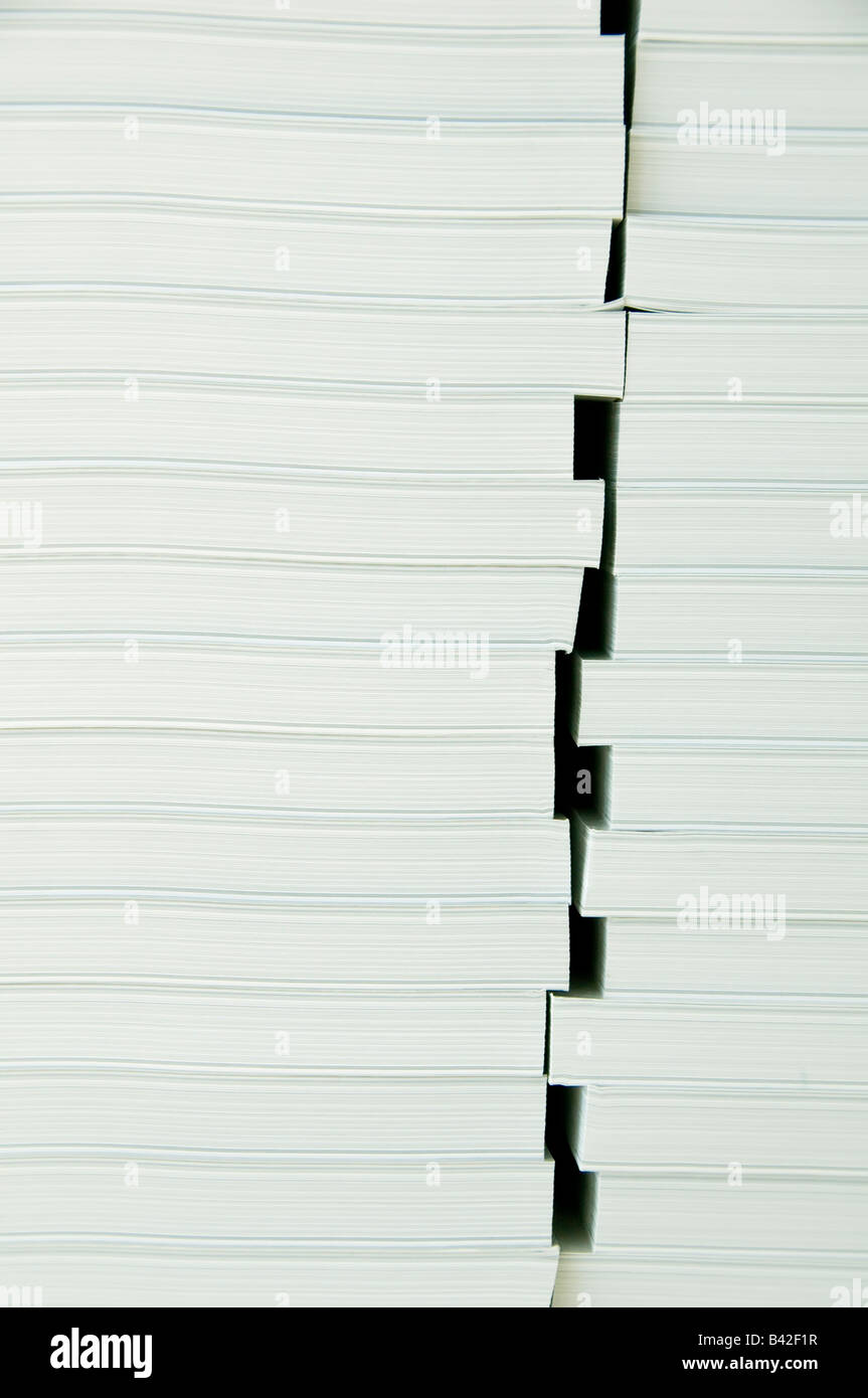 Two stacks of bulky medical journals seen on end with gaps between them Stock Photo