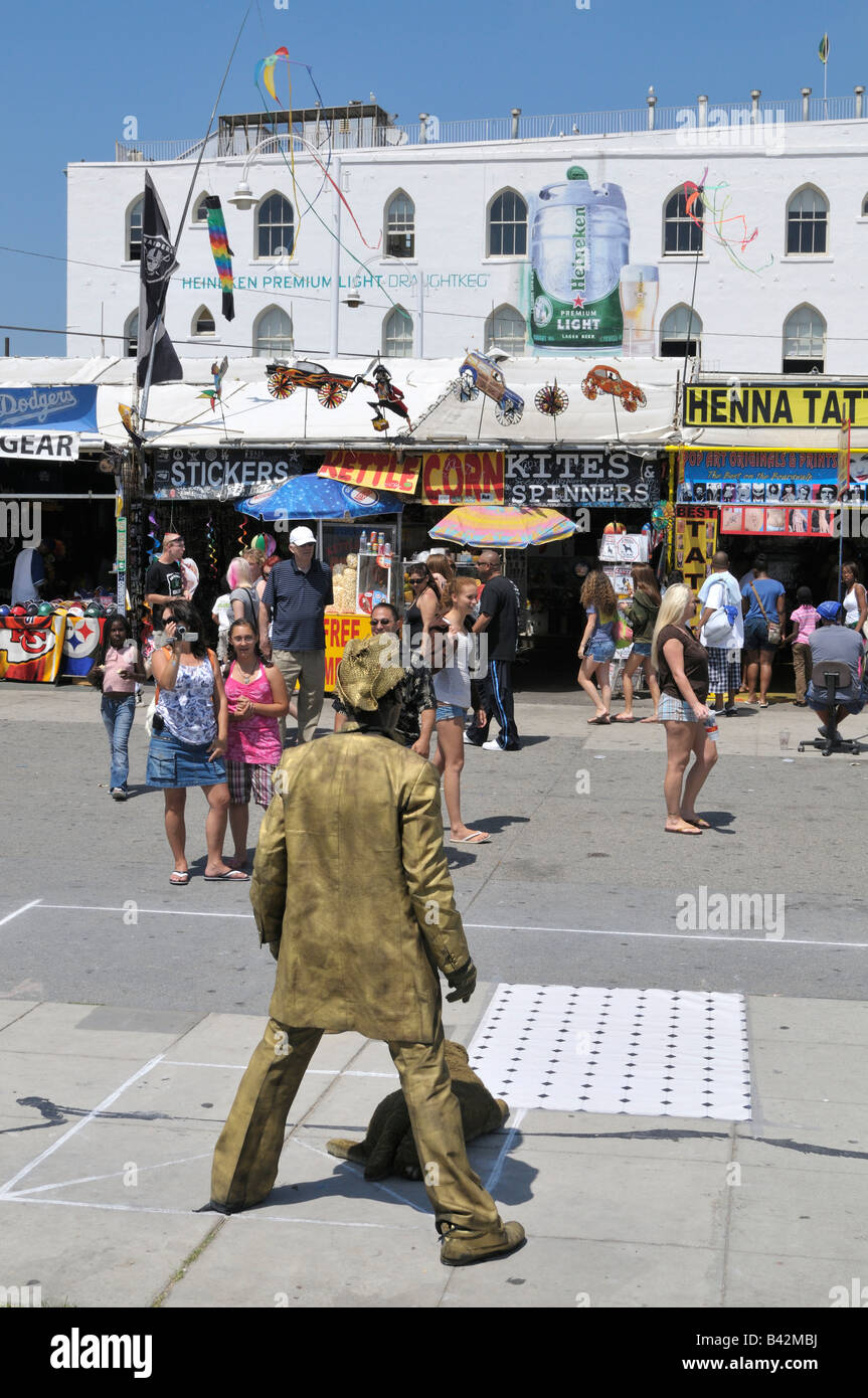 Gold colored performance artist Stock Photo