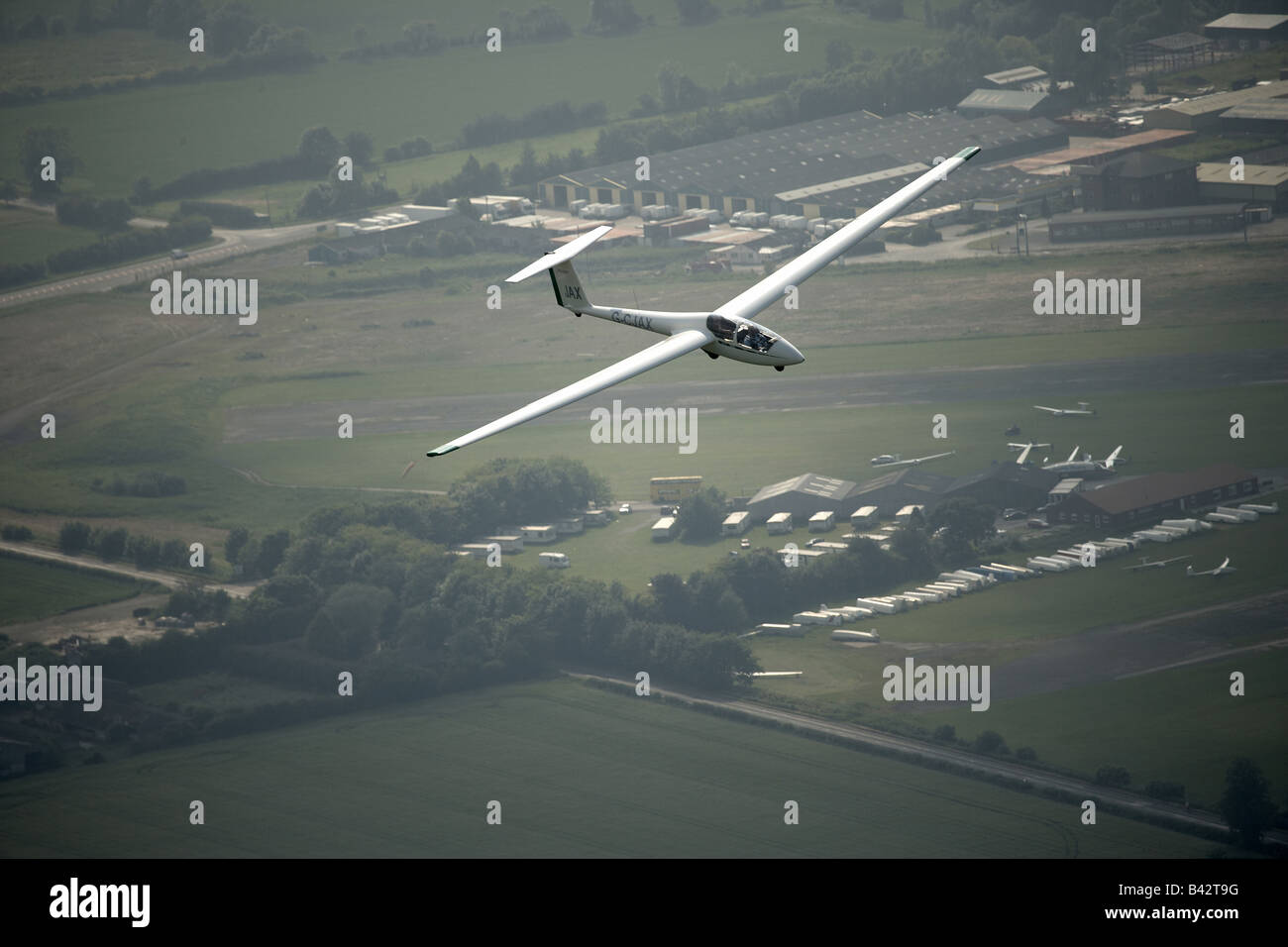 Glider flying over the wolds gliding club air base the old wartime airfield Pocklington East Yorkshire UK Stock Photo